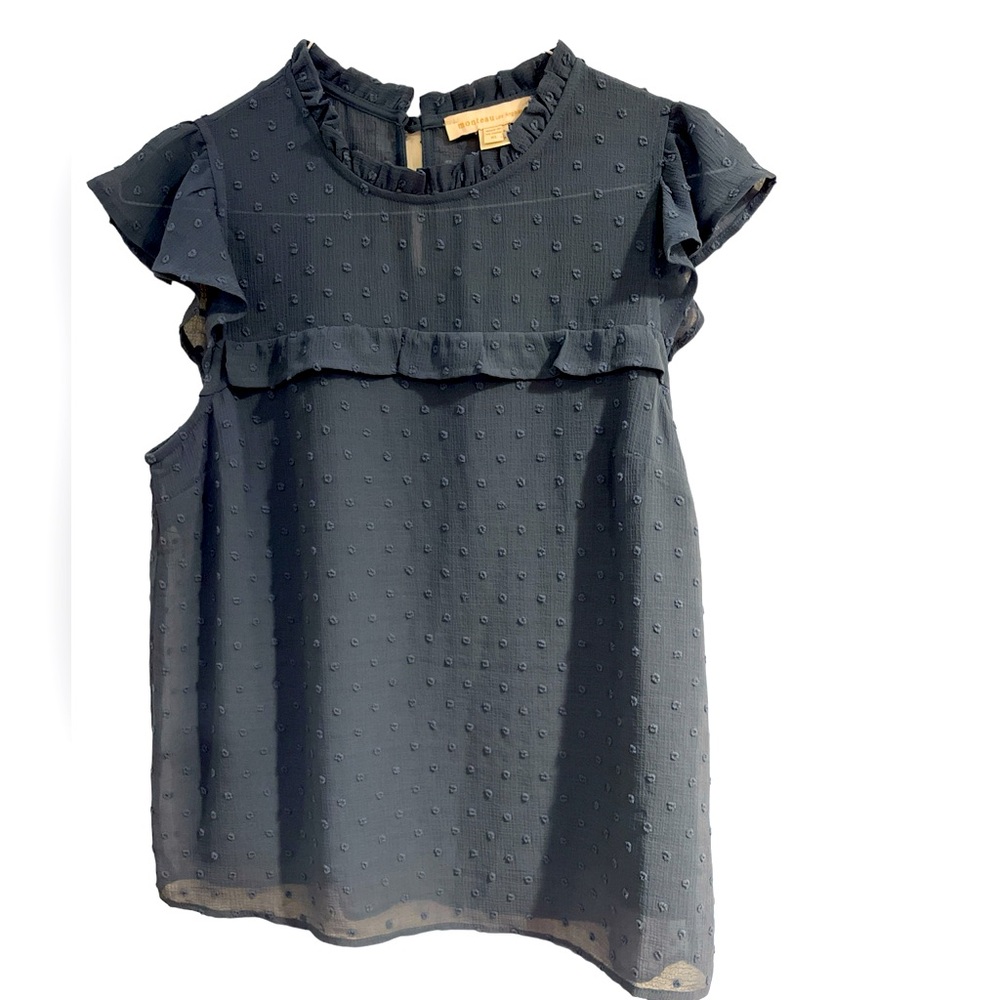 Ladies sleeveless textured blouse with ruffles